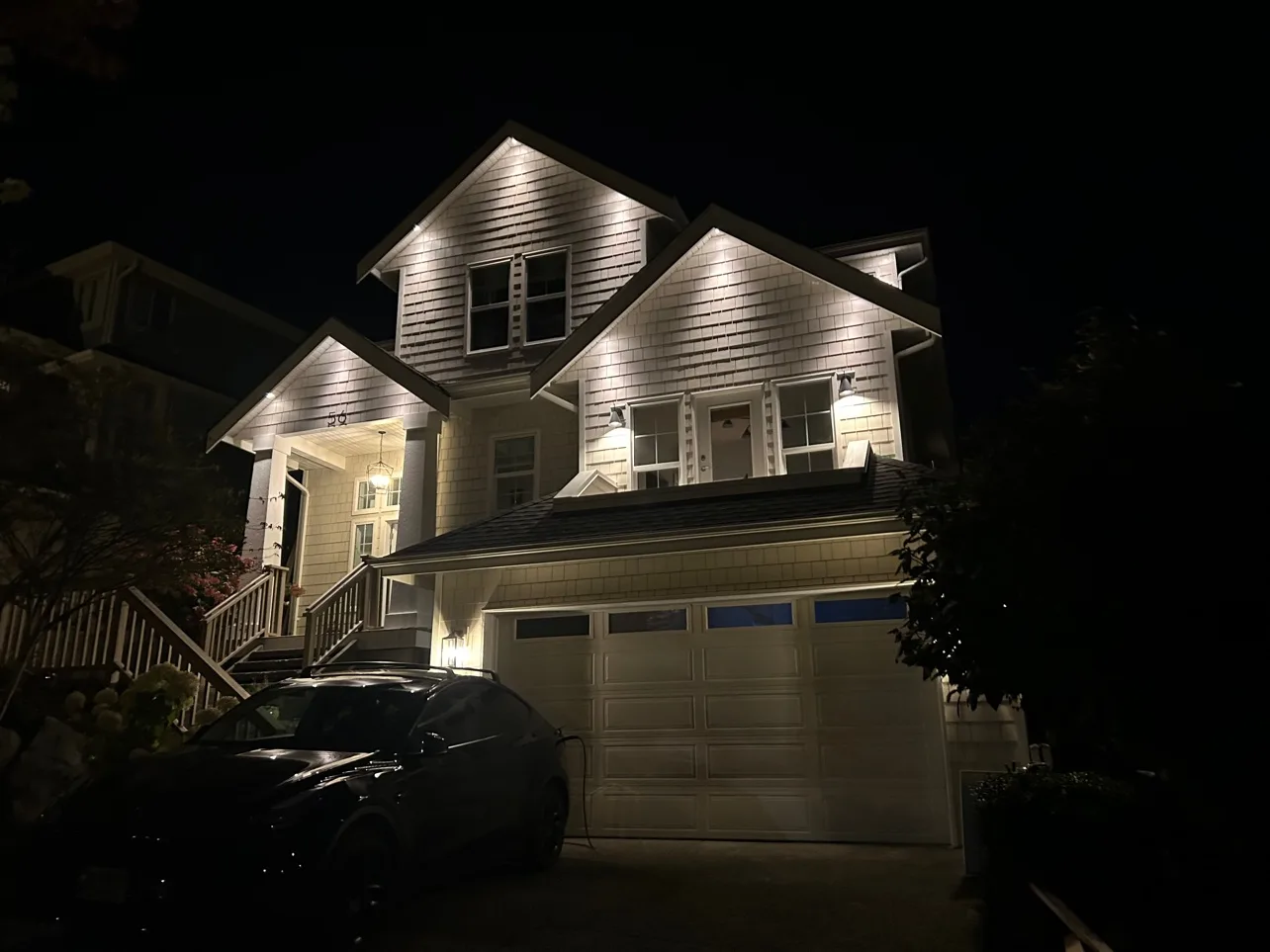 Our own home, Port Moody — finished exterior at night, soffit lighting