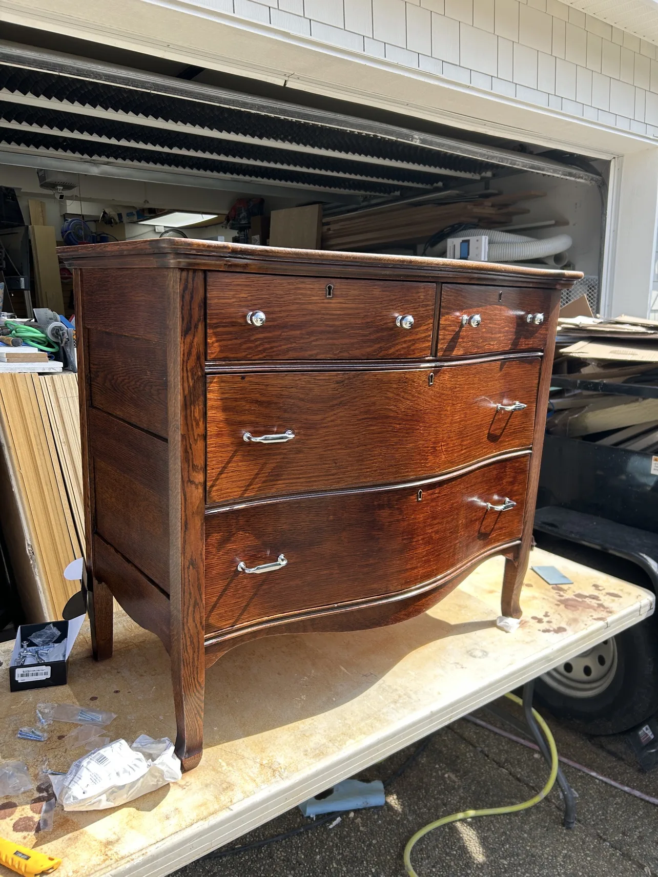Antique dresser refinished as a powder-room vanity
