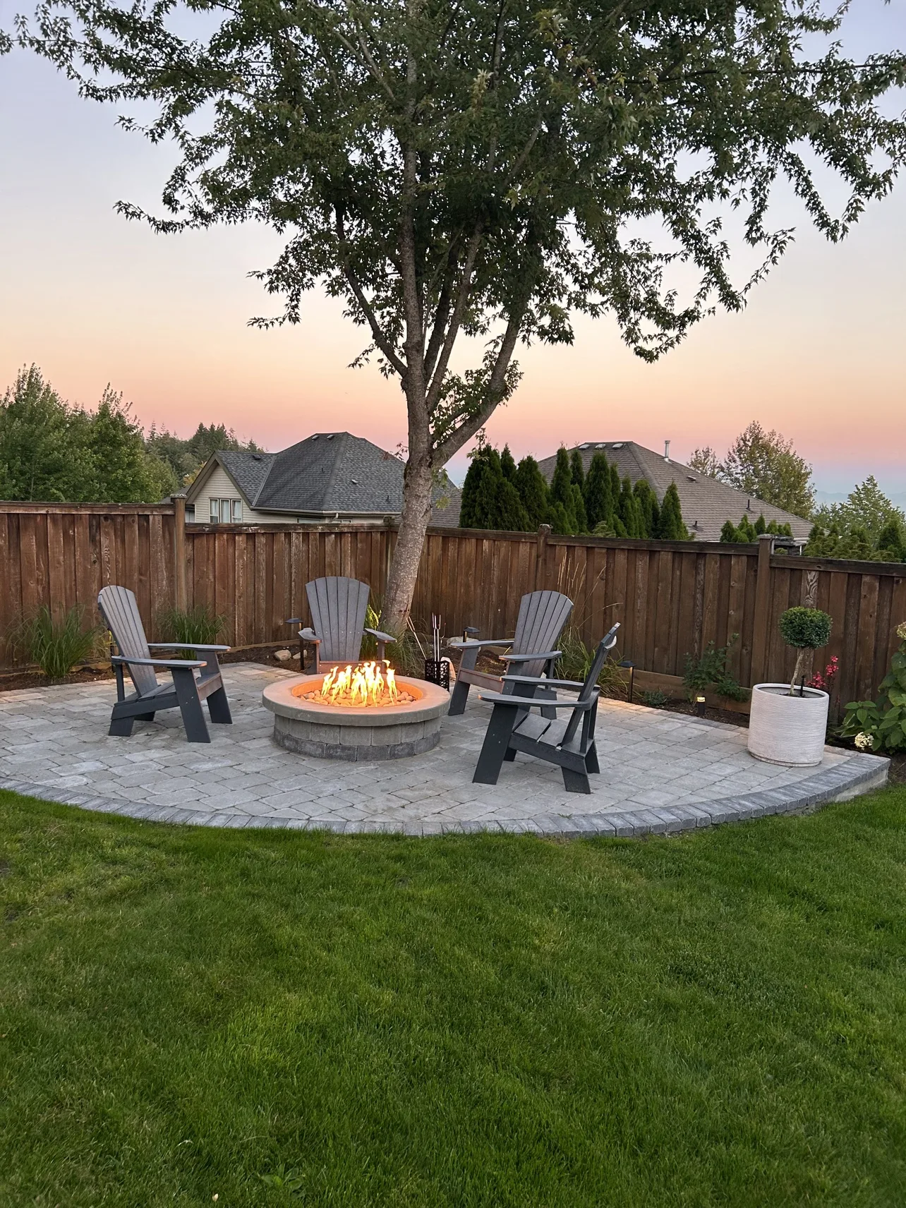 Fire pit first fire at dusk