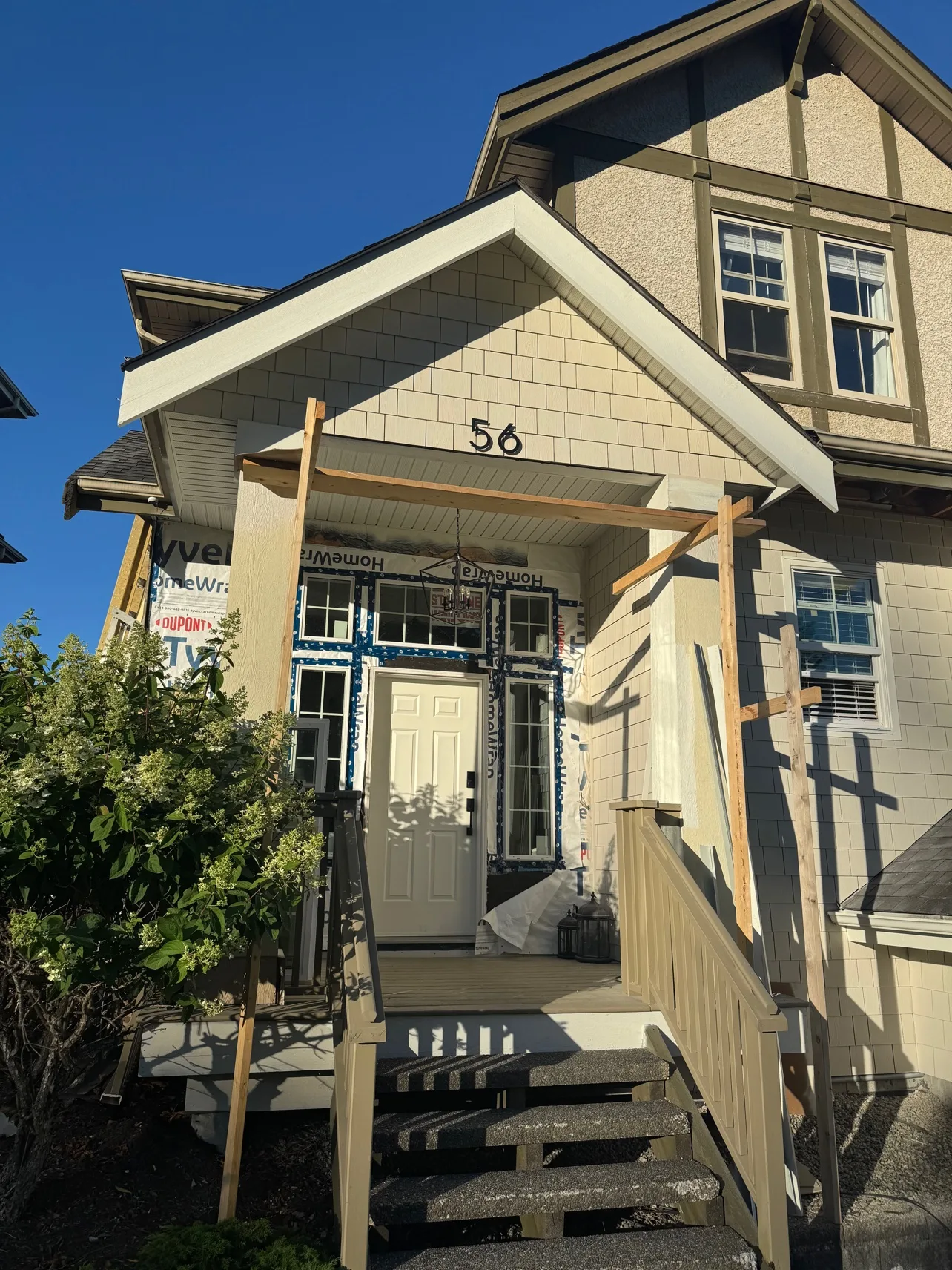 House during re-side, porch build