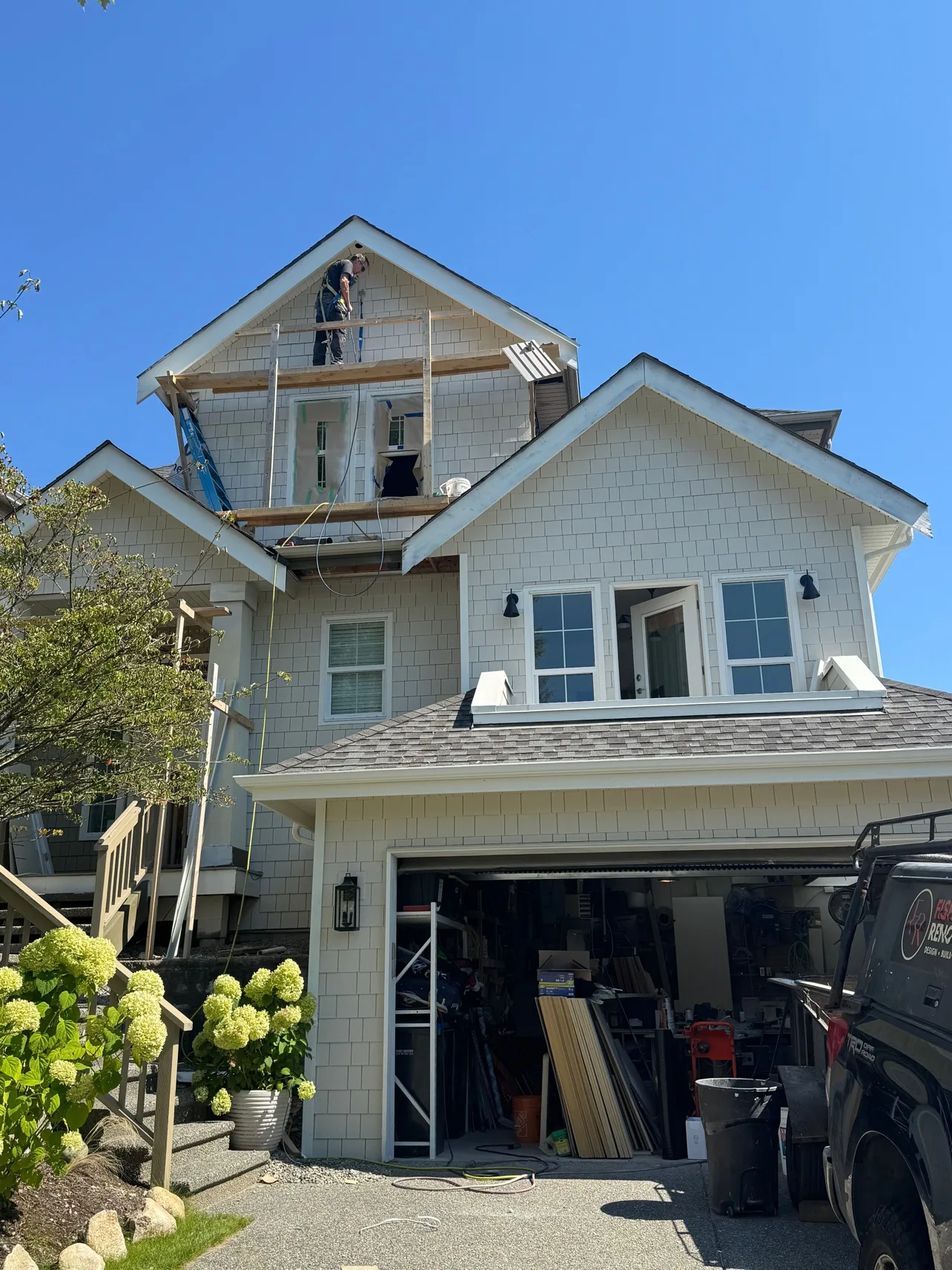House during re-side, scaffold at the gable