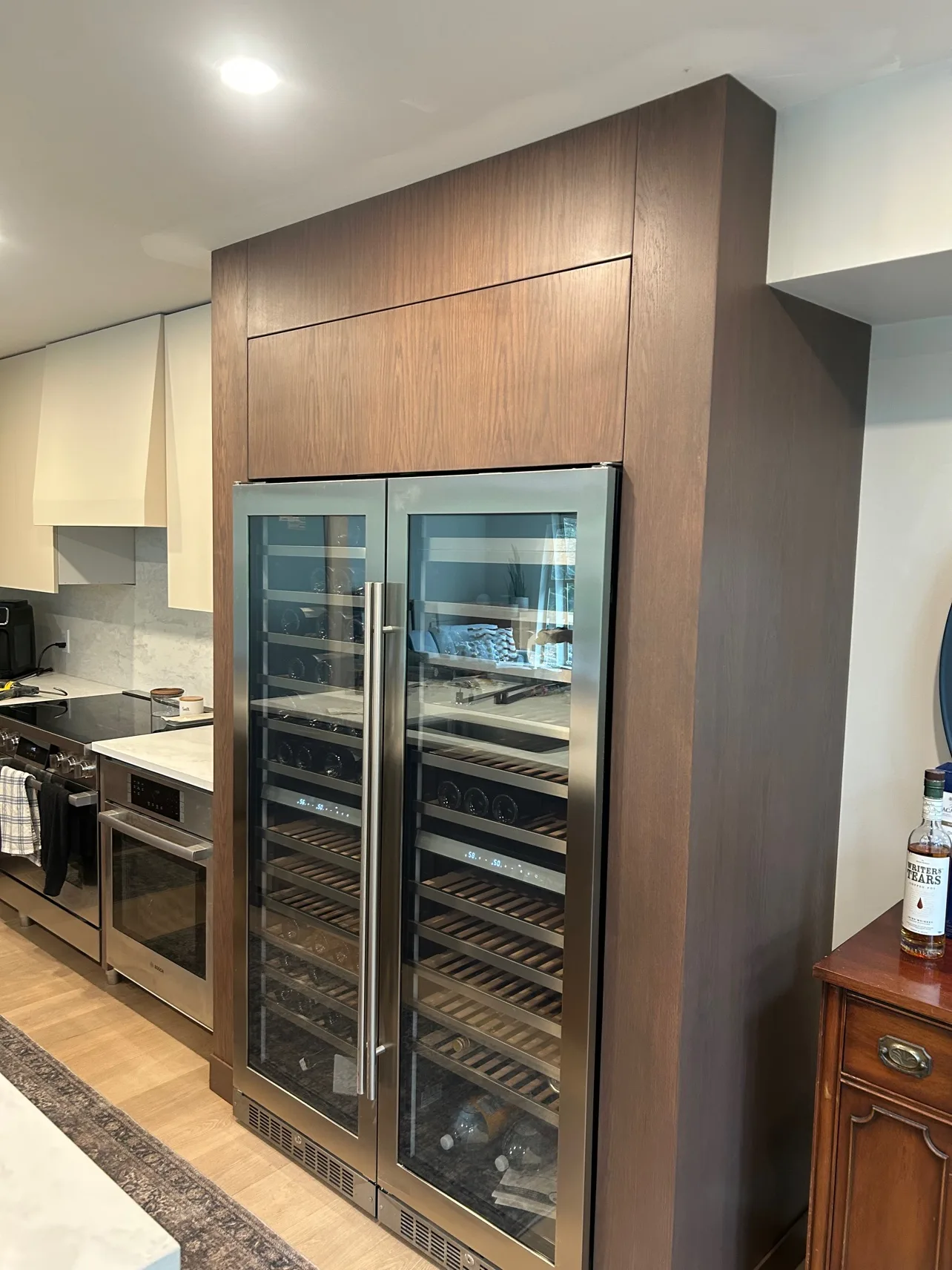 Ravine condo kitchen wine wall with wine fridge