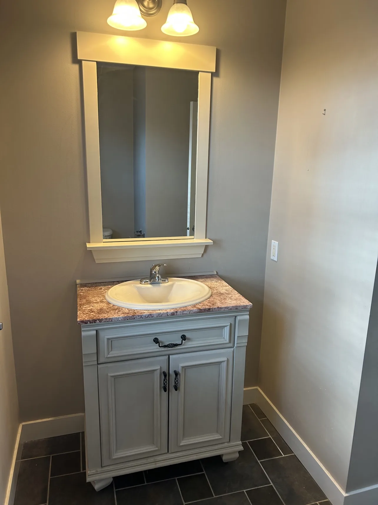 Powder room before: old vanity